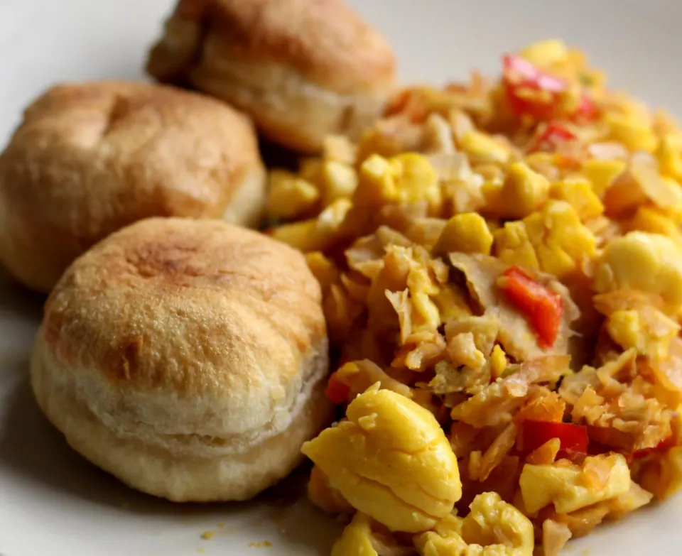 Ackee and saltfish served with fried dumplings